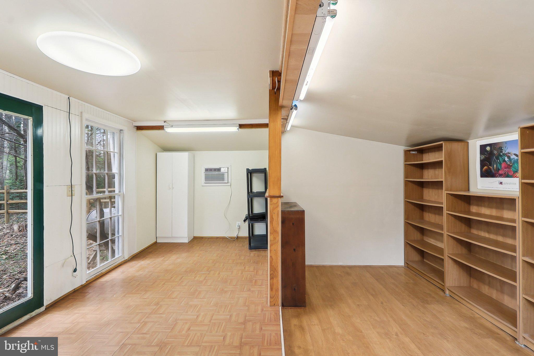 4212 Wakefield Drive Annandale, VA 22003 - Photo 54 of 67 a view of empty room with wooden floor and fan