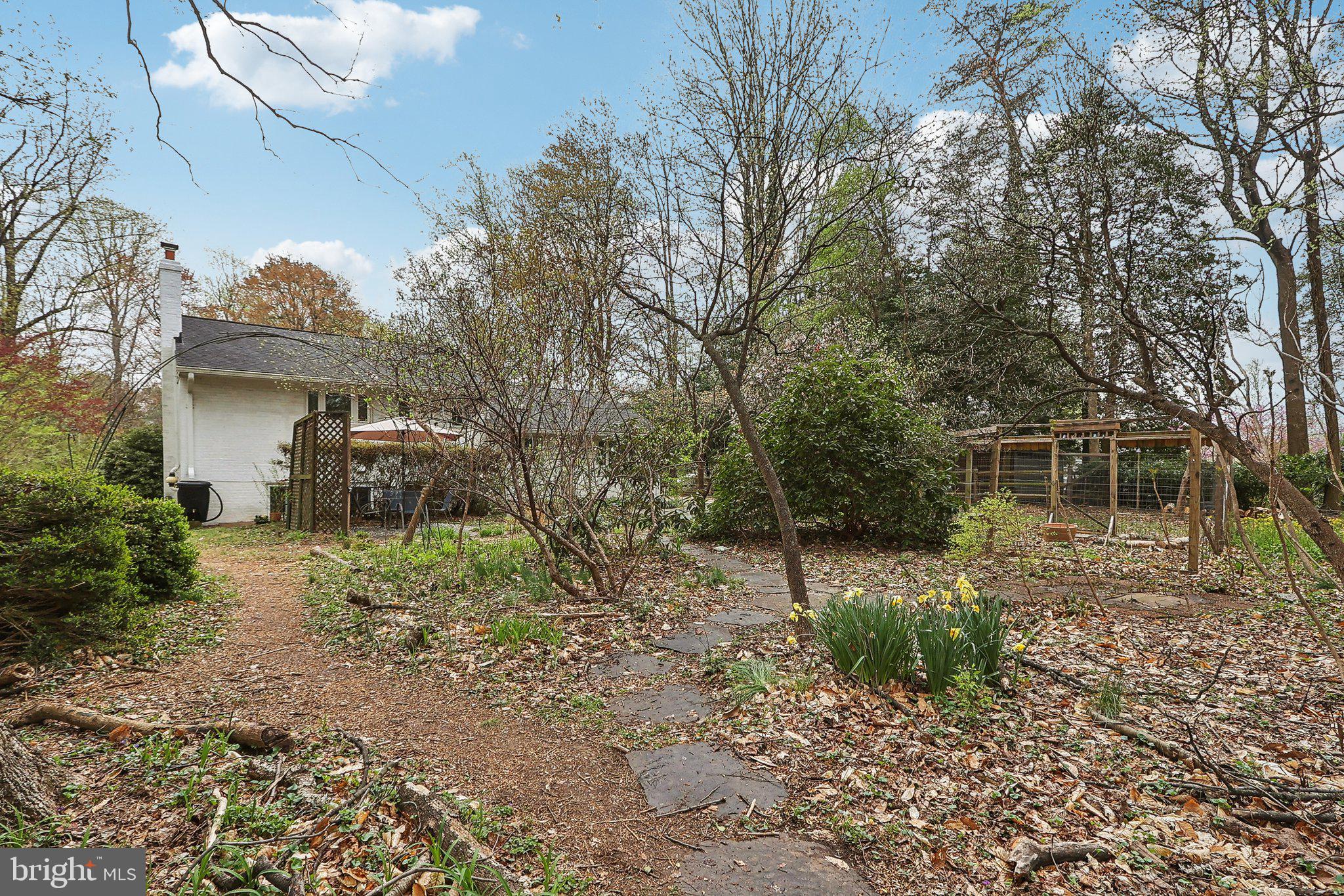 4212 Wakefield Drive Annandale, VA 22003 - Photo 58 of 67 a view of a house with a yard and hanging chair
