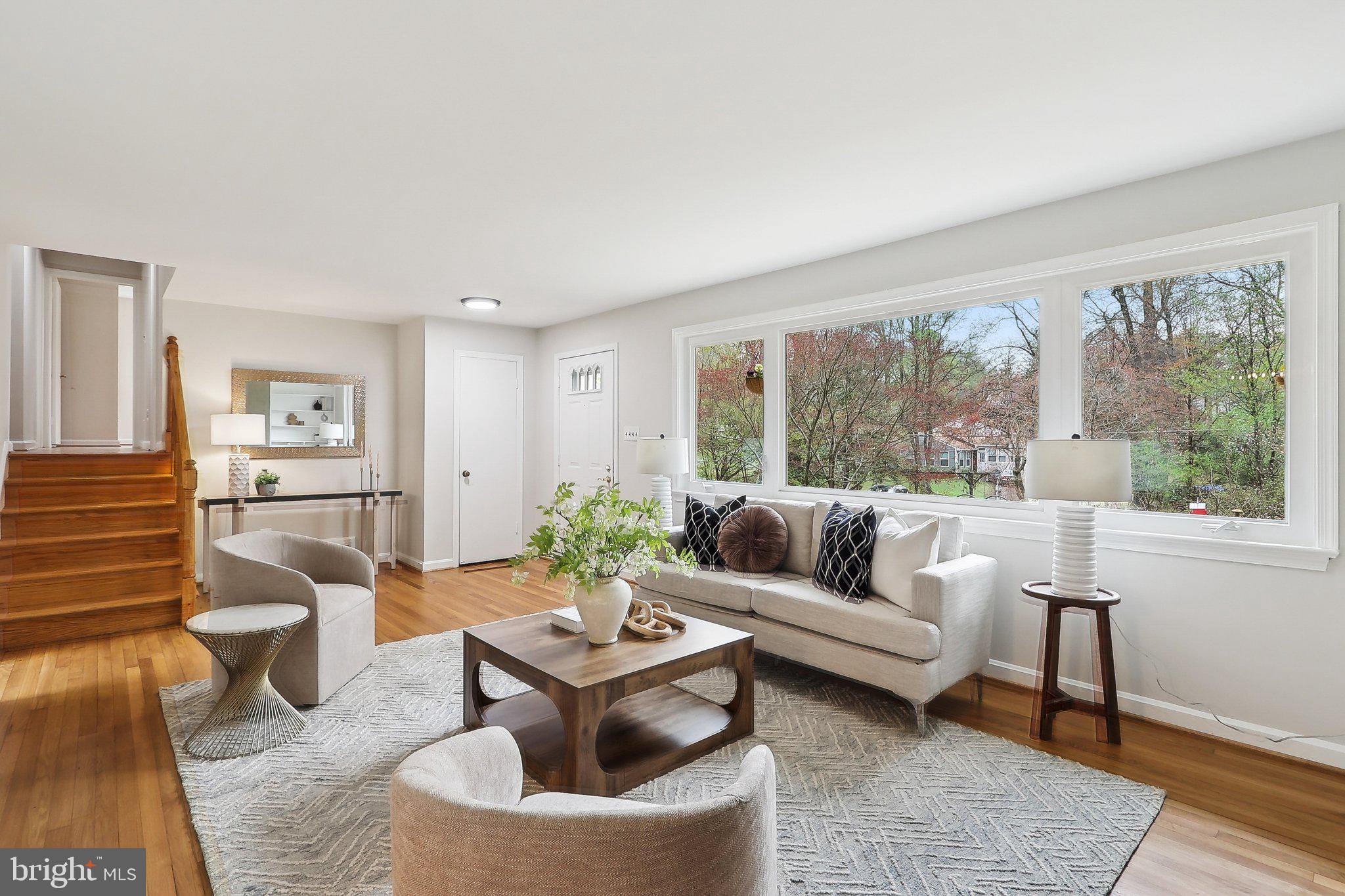 4212 Wakefield Drive Annandale, VA 22003 - Photo 7 of 67 a living room with furniture and a large window