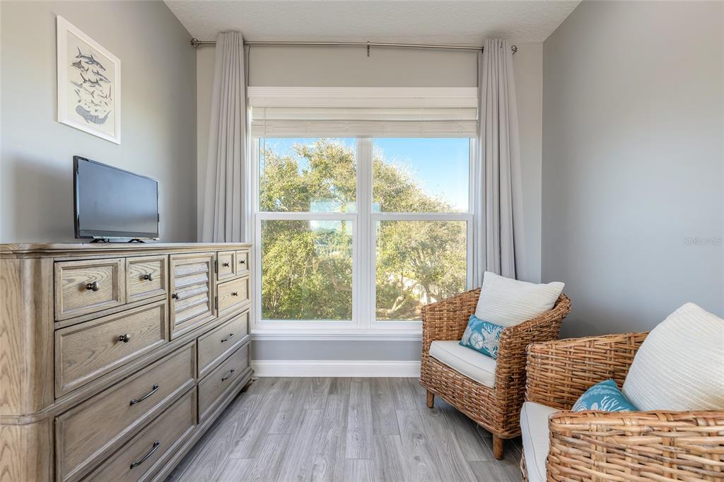 4641 Riverwalk Village Court Ponce Inlet, FL 32127 - Photo 14 of 74 a living room with furniture and flat screen tv