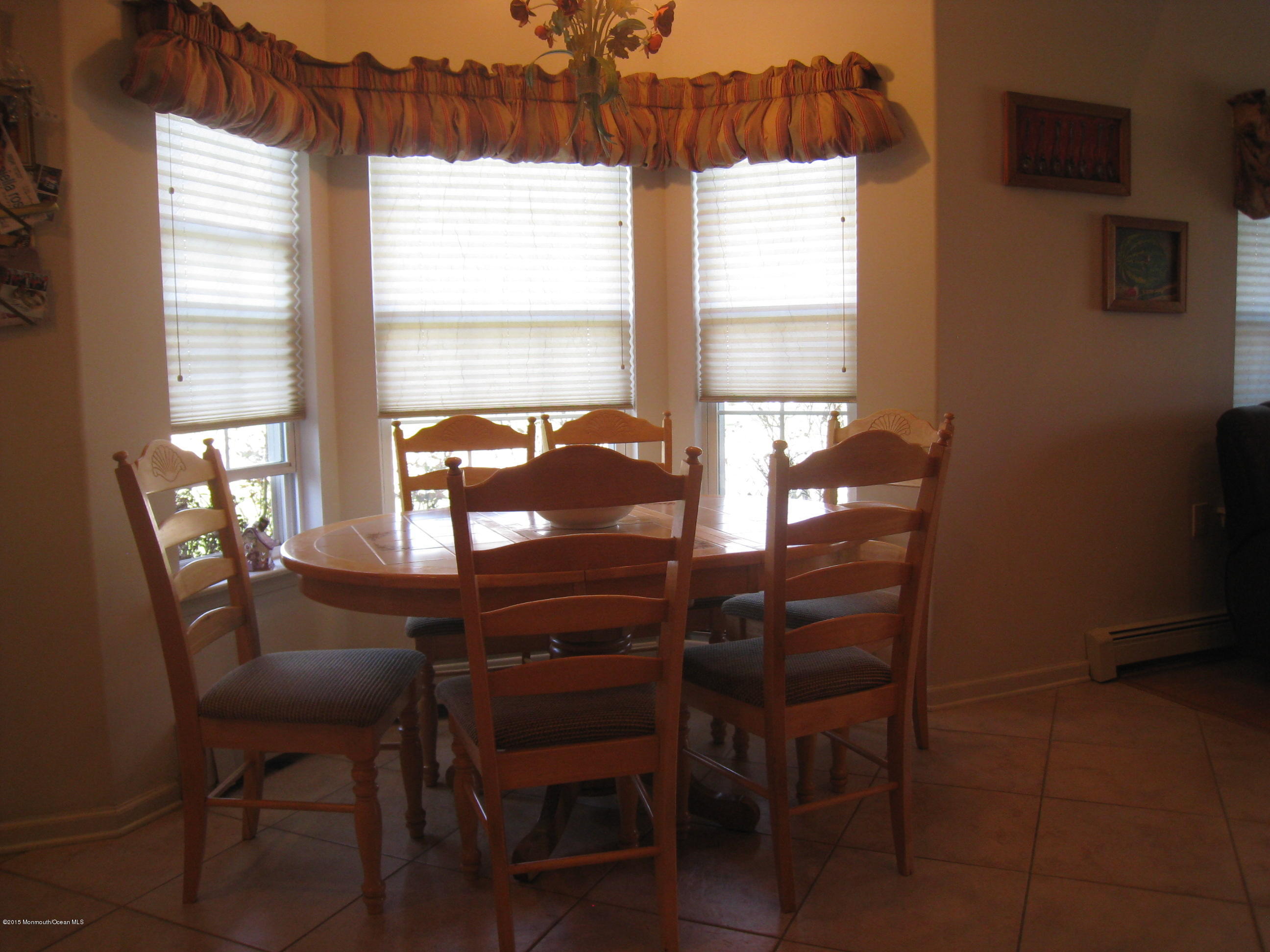 4 Ravello Road Manchester Township, NJ 08759 - Photo 5 of 27 a dining room with furniture and window