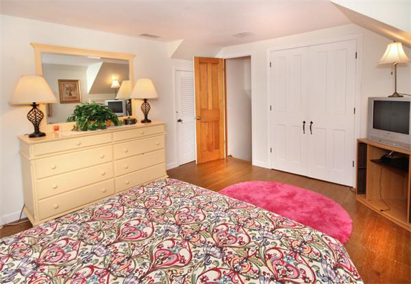 50 Towne Road Boxford, MA 01921 - Photo 14 of 30 a bedroom with a bed and a dresser in it