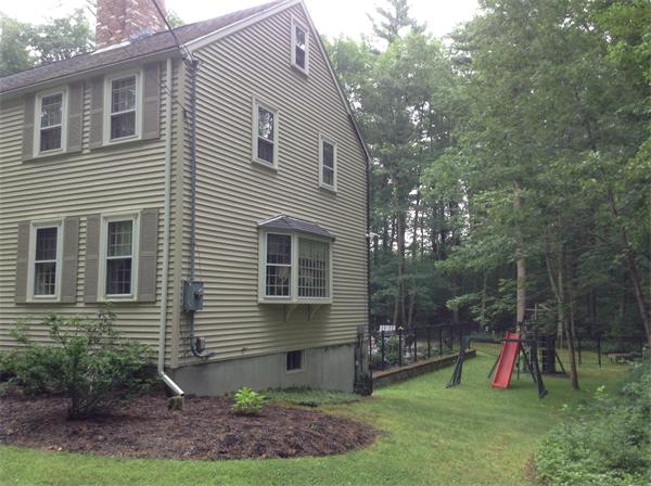 50 Towne Road Boxford, MA 01921 - Photo 28 of 30 a view of a backyard with plants and a table