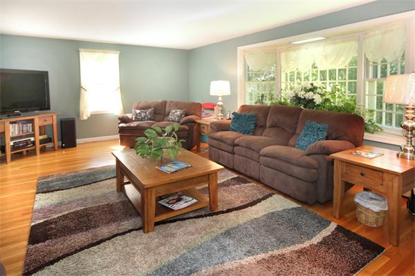 50 Towne Road Boxford, MA 01921 - Photo 4 of 30 a living room with furniture and a flat screen tv