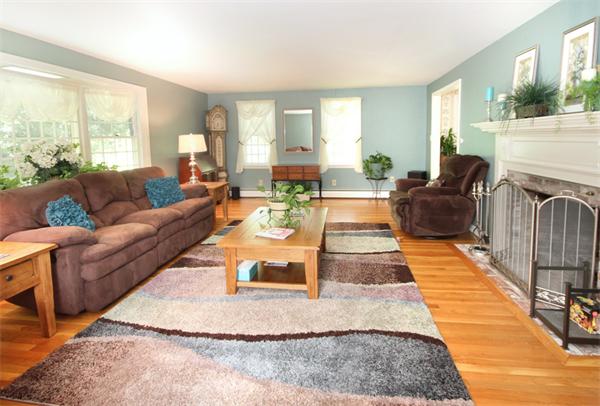 50 Towne Road Boxford, MA 01921 - Photo 5 of 30 a living room with furniture and a fireplace