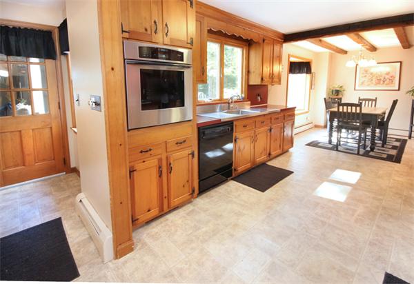50 Towne Road Boxford, MA 01921 - Photo 8 of 30 a kitchen with stainless steel appliances granite countertop a stove and a refrigerator
