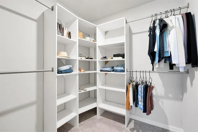 a bathroom with cabinets and sink