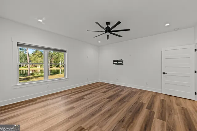 an aerial view of house with yard swimming pool and outdoor seating