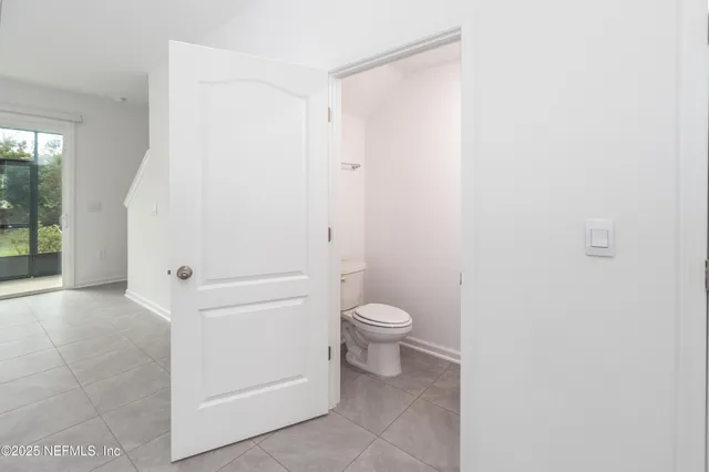 a kitchen with a refrigerator stove and microwave