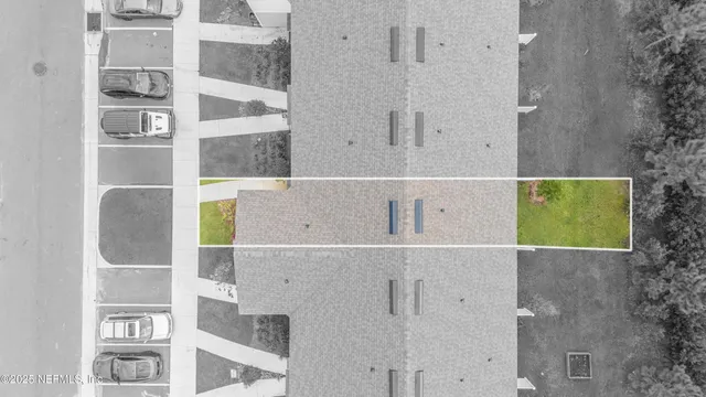 a view of house with yard in front of it