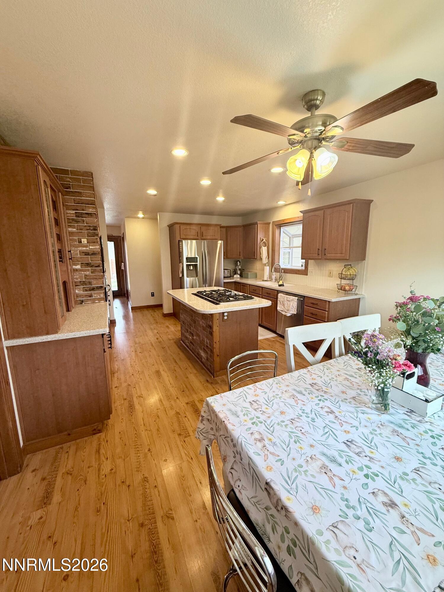 4734 Killdeer Road Carson City, NV 89701 - Photo 23 of 40 a living room with stainless steel appliances kitchen island granite countertop furniture and a kitchen view