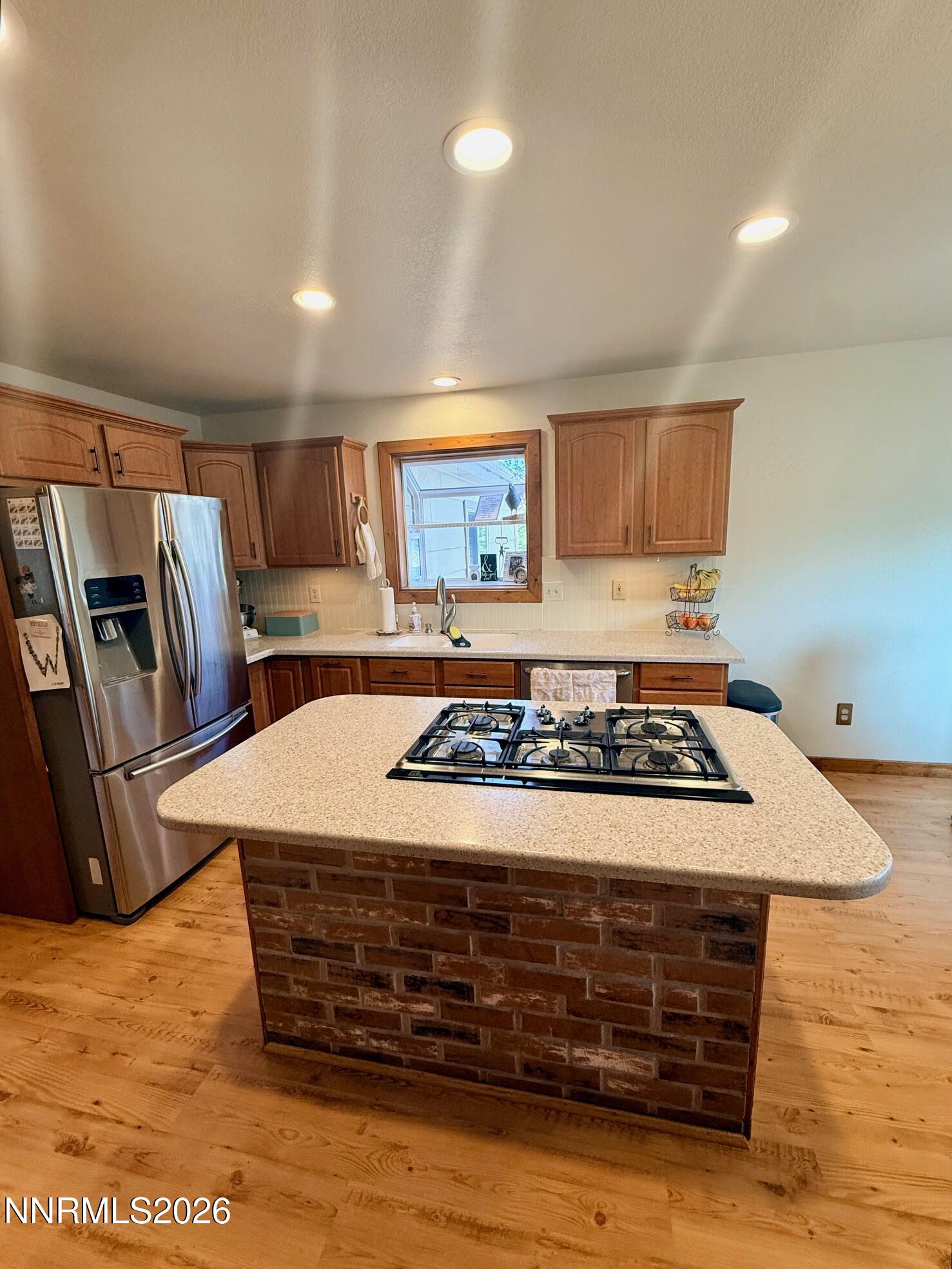 4734 Killdeer Road Carson City, NV 89701 - Photo 25 of 40 a stove top oven sitting inside of a kitchen