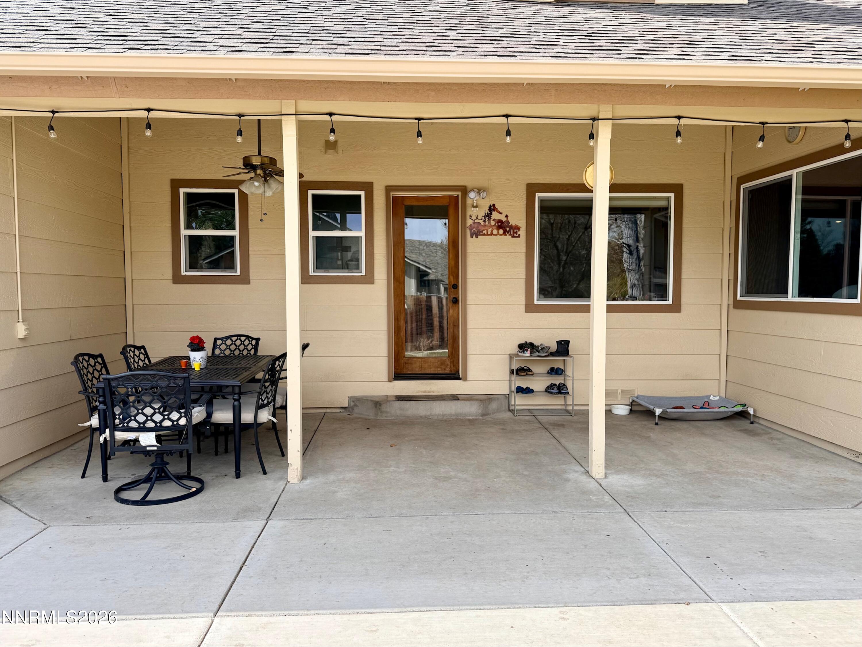 4734 Killdeer Road Carson City, NV 89701 - Photo 9 of 40 a patio with table and chairs