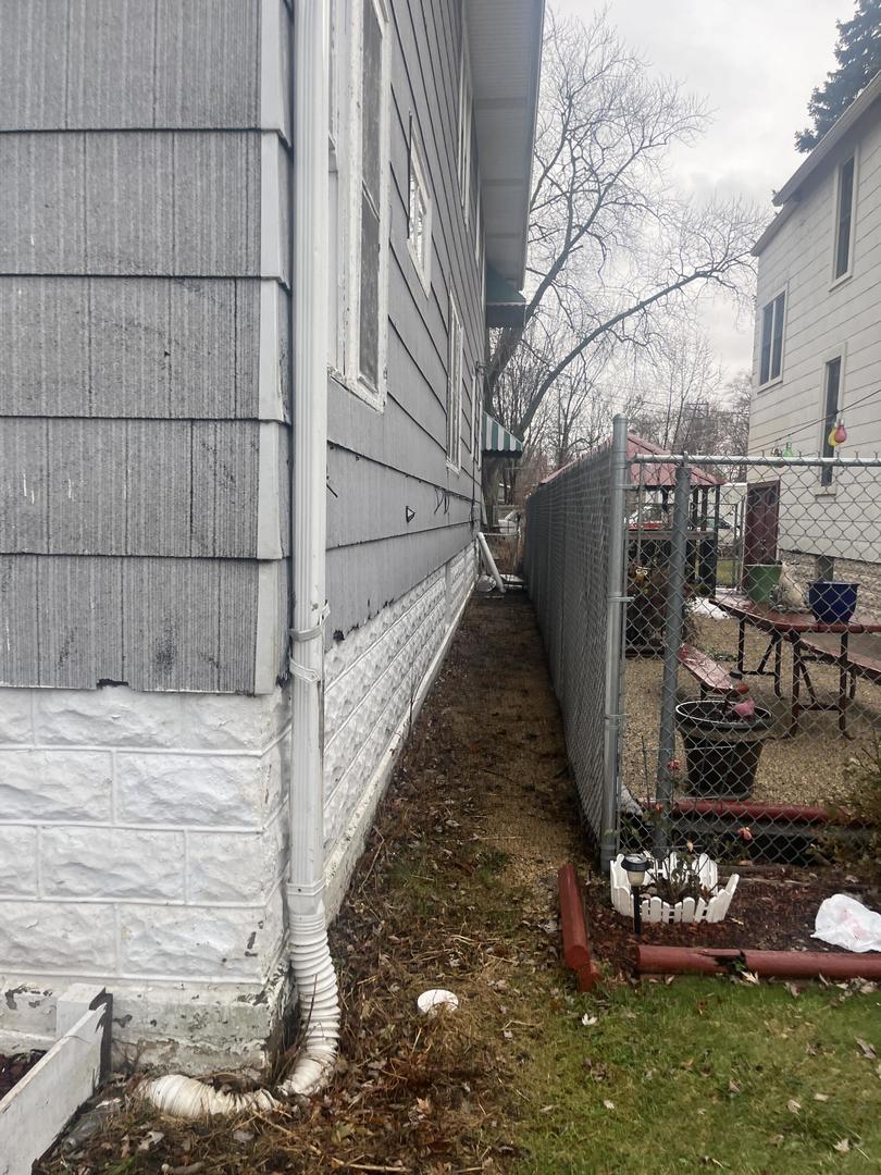 237 West 114th Street Chicago, IL 60628 - Photo 27 of 27 a view of a backyard with pathway