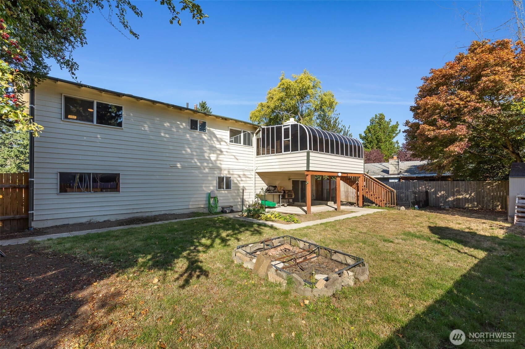 25322 32nd Place South Kent, WA 98032 - Photo 19 of 20 a front view of a house with a yard