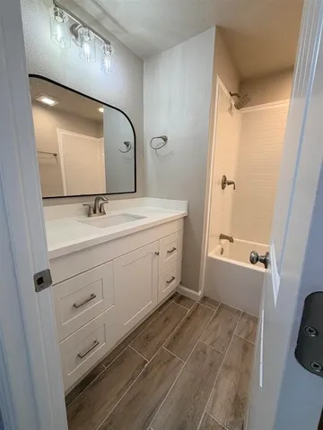 a view of a room that has a large window