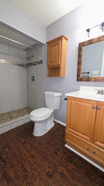 731 Leading Lane Allen, TX 75002 - Photo 13 of 18 a bathroom with a toilet and a shower