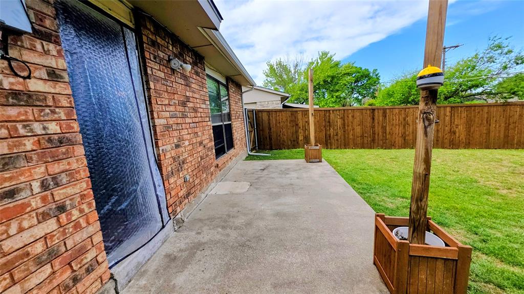 731 Leading Lane Allen, TX 75002 - Photo 16 of 18 a view of an entrance to house with yard