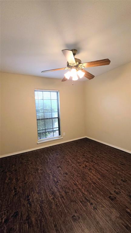 731 Leading Lane Allen, TX 75002 - Photo 6 of 18 a view of an empty room with wooden floor and a window