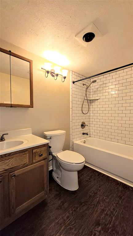 731 Leading Lane Allen, TX 75002 - Photo 10 of 18 a bathroom with a toilet sink and mirror