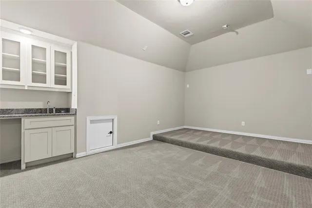 a view of kitchen and windows