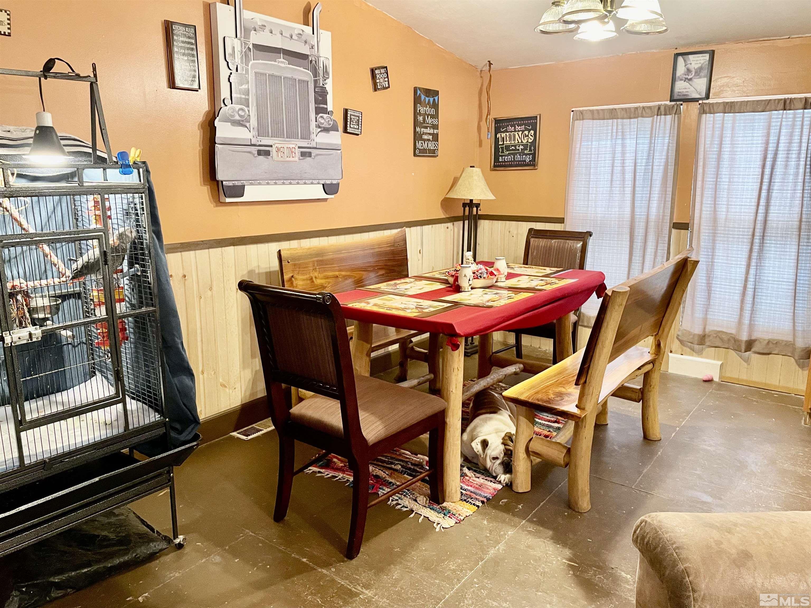 555 Harry Road Winnemucca, NV 89445 - Photo 4 of 11 a dining room with furniture and wooden floor