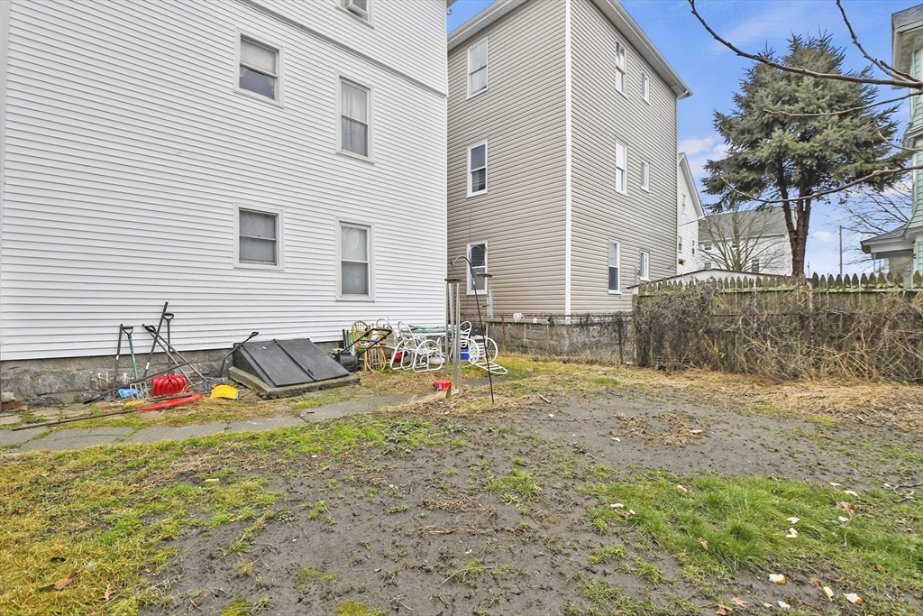 50 Beacon Street Fall River, MA 02721 - Photo 29 of 32 a view of the backyard of the house