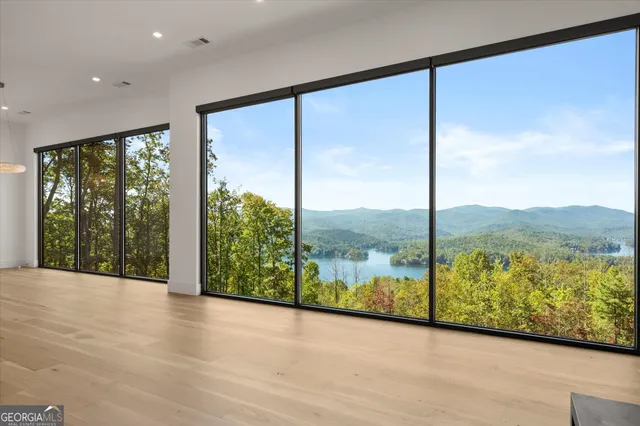 a view of a room with a large window