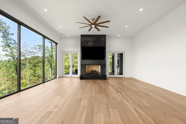 a kitchen with stainless steel appliances granite countertop a sink and cabinets