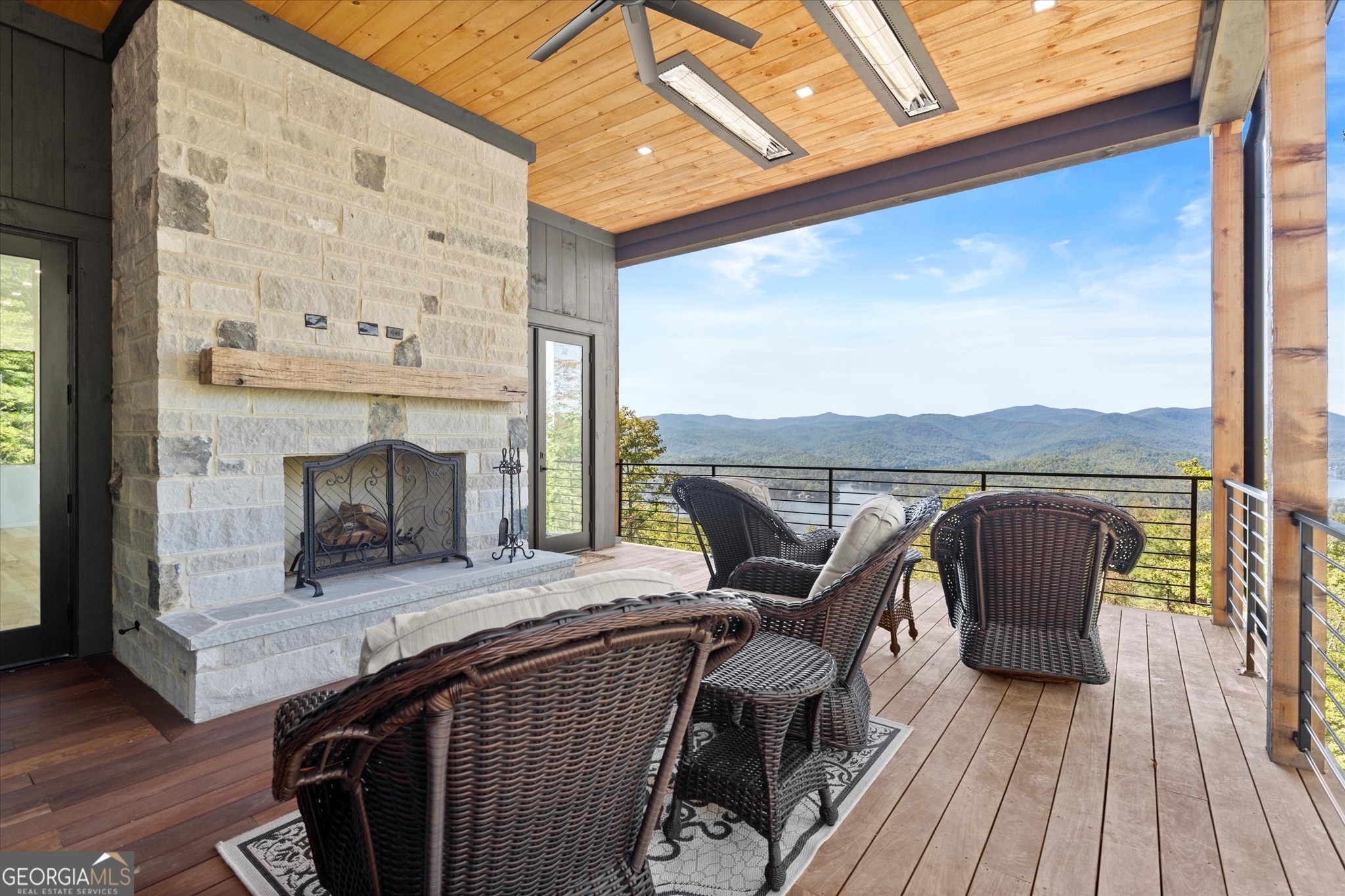 1572 Parker Holifield Road Tiger, GA 30576 - Photo 20 of 84 a view of balcony with furniture and wooden floor