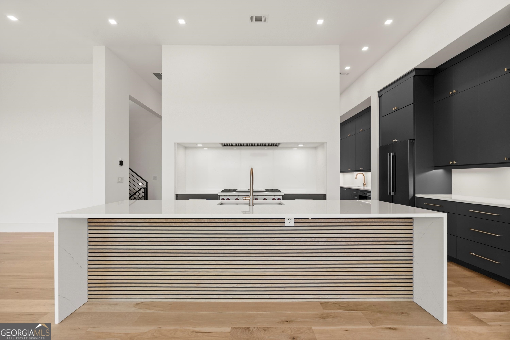 1572 Parker Holifield Road Tiger, GA 30576 - Photo 28 of 84 a kitchen with stainless steel appliances granite countertop a sink and cabinets