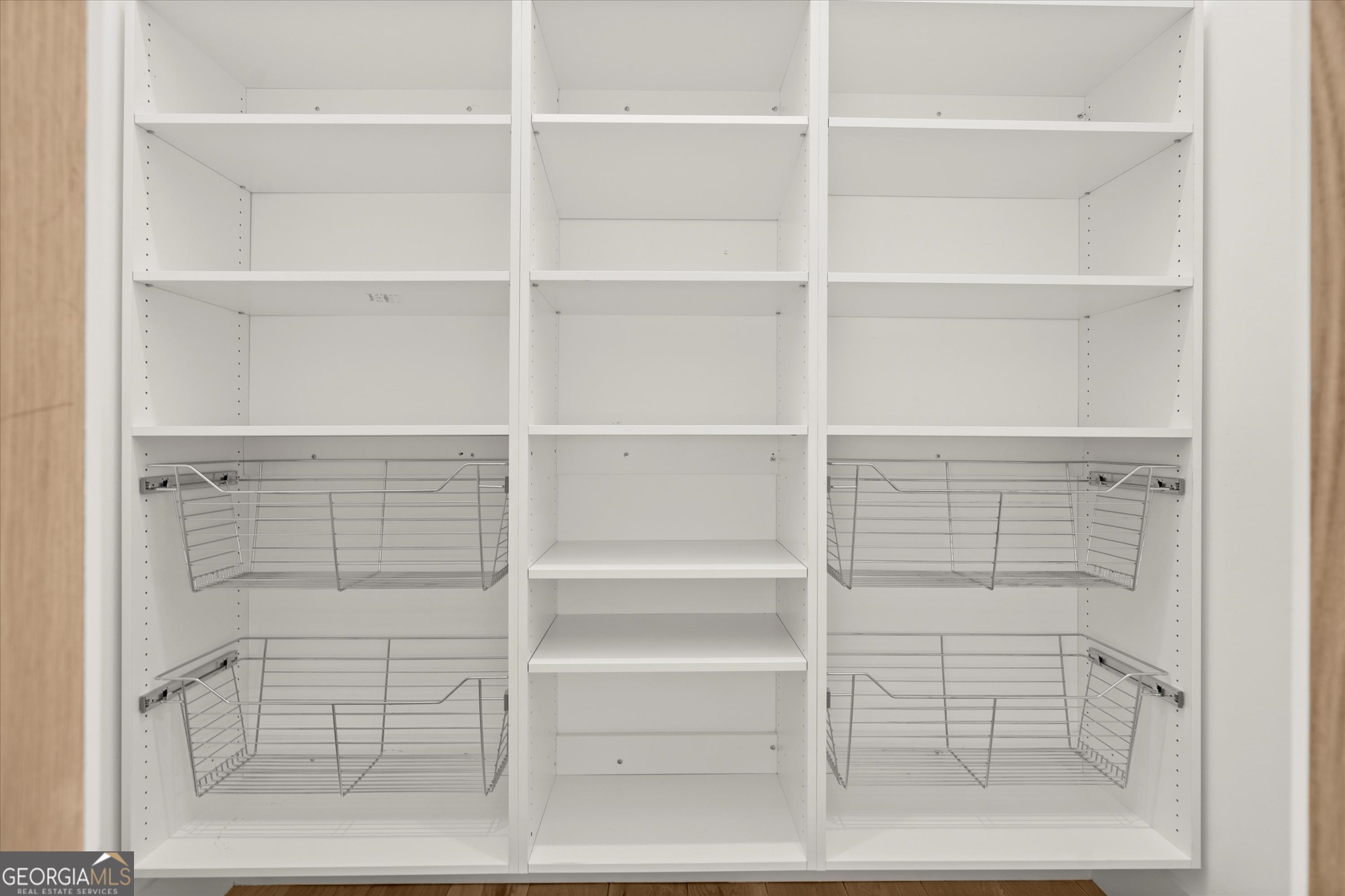 1572 Parker Holifield Road Tiger, GA 30576 - Photo 36 of 84 a view of walk in closet with empty racks