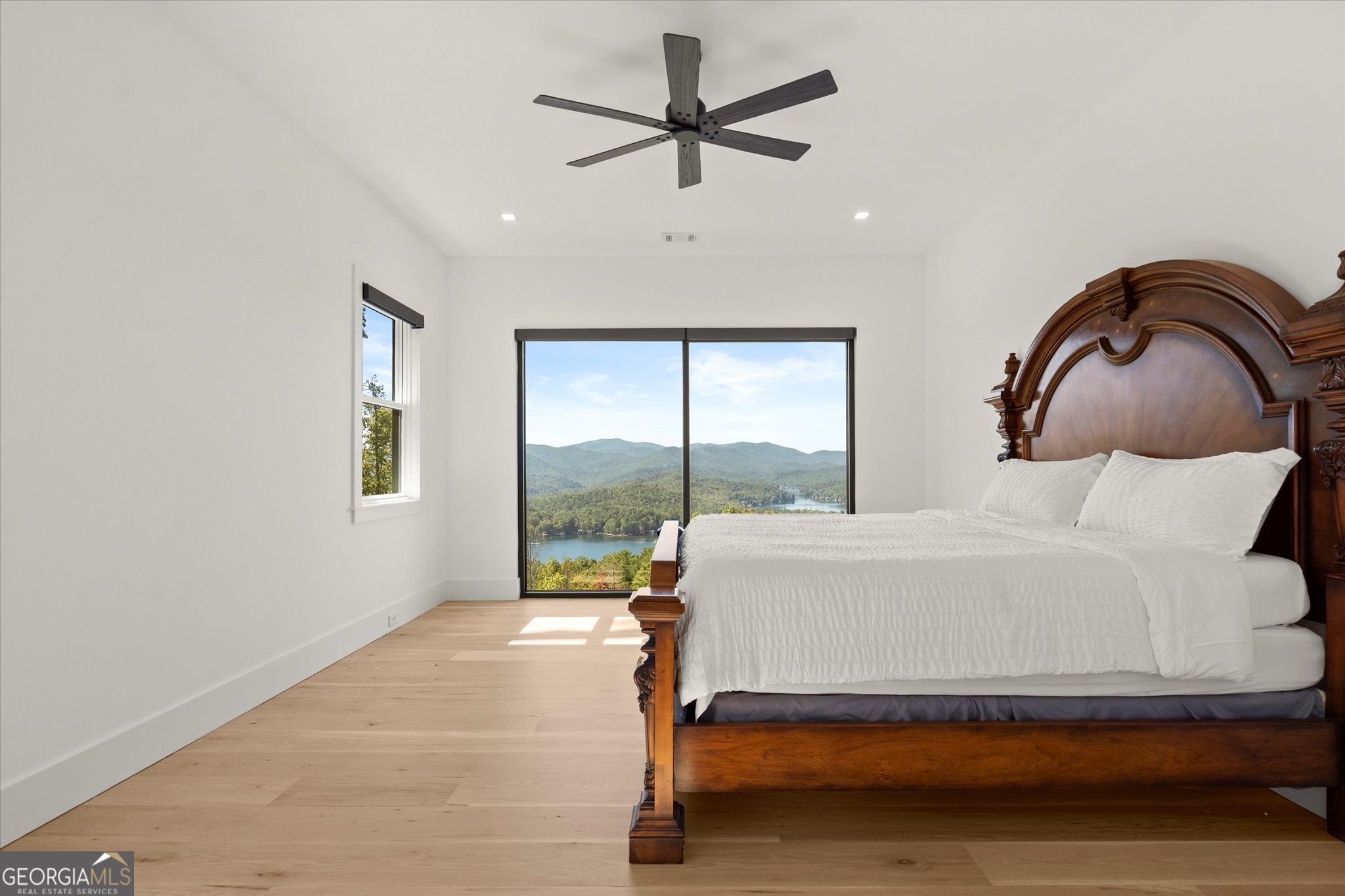 1572 Parker Holifield Road Tiger, GA 30576 - Photo 39 of 84 a living room with a bed furniture and a large window