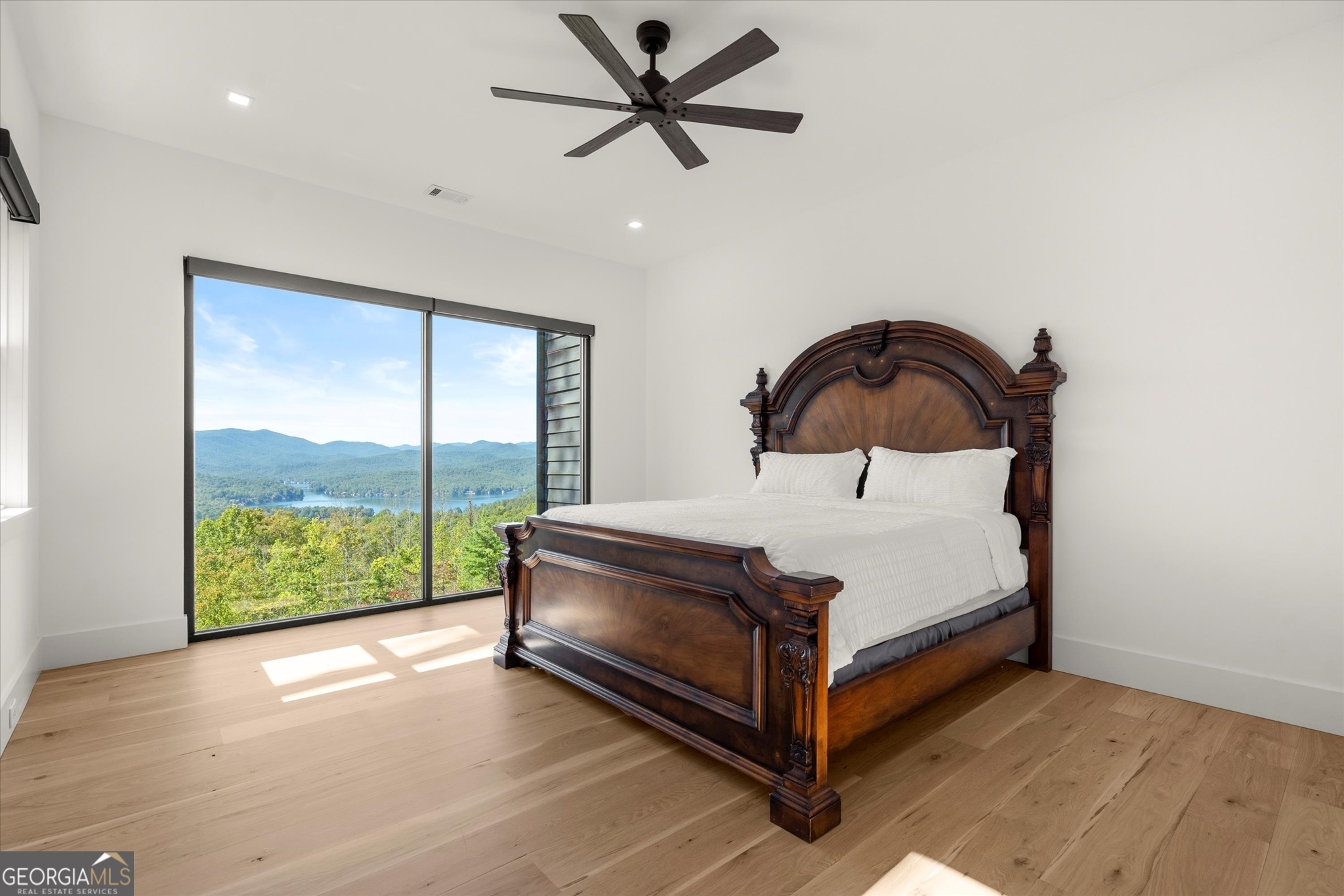 1572 Parker Holifield Road Tiger, GA 30576 - Photo 40 of 84 a bedroom with a bed and window