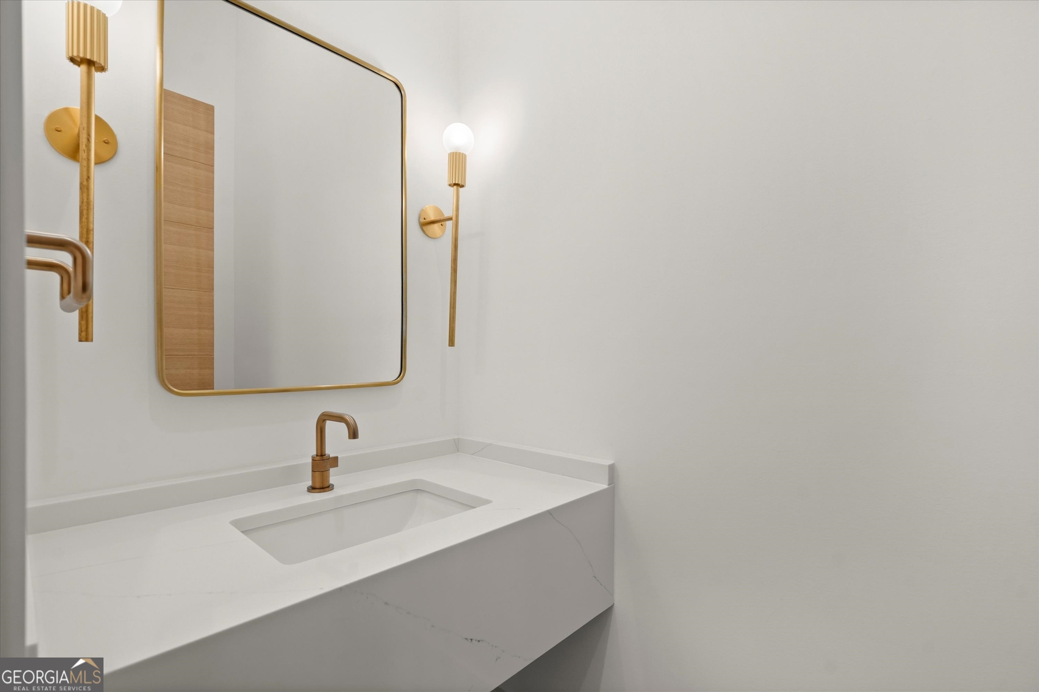 1572 Parker Holifield Road Tiger, GA 30576 - Photo 52 of 84 a bathroom with a sink and mirror