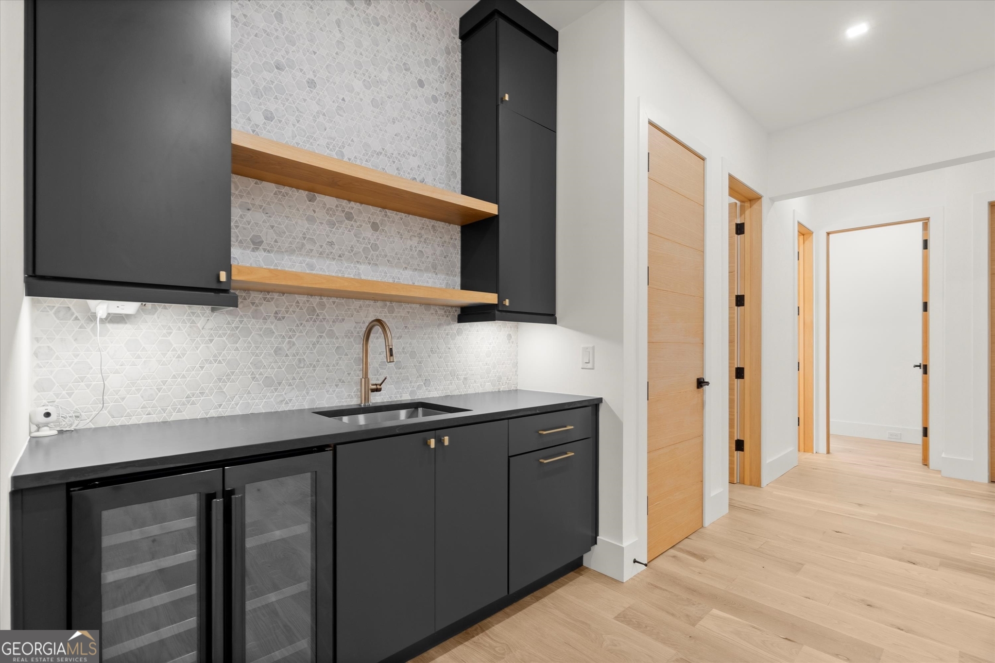 1572 Parker Holifield Road Tiger, GA 30576 - Photo 55 of 84 a kitchen with a sink and a mirror