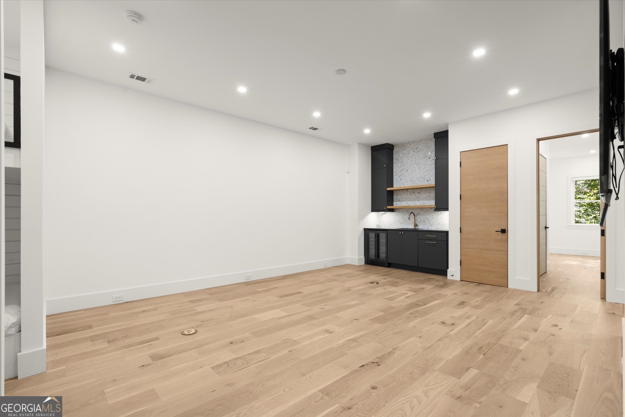1572 Parker Holifield Road Tiger, GA 30576 - Photo 58 of 84 a view of a kitchen with a sink and a refrigerator