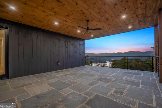 a view of a street with a garden