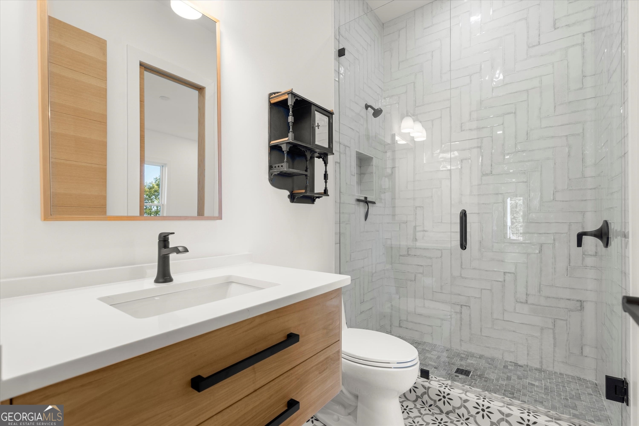 1572 Parker Holifield Road Tiger, GA 30576 - Photo 61 of 84 a bathroom with a sink a toilet a shower and a mirror