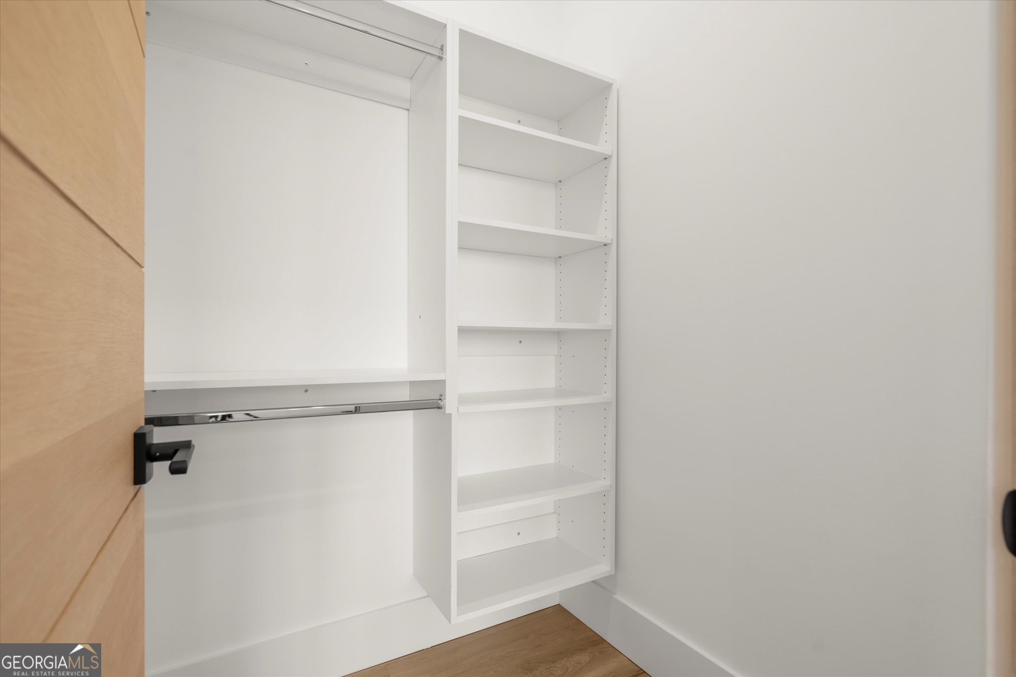 1572 Parker Holifield Road Tiger, GA 30576 - Photo 64 of 84 a view of walk in closet with empty racks