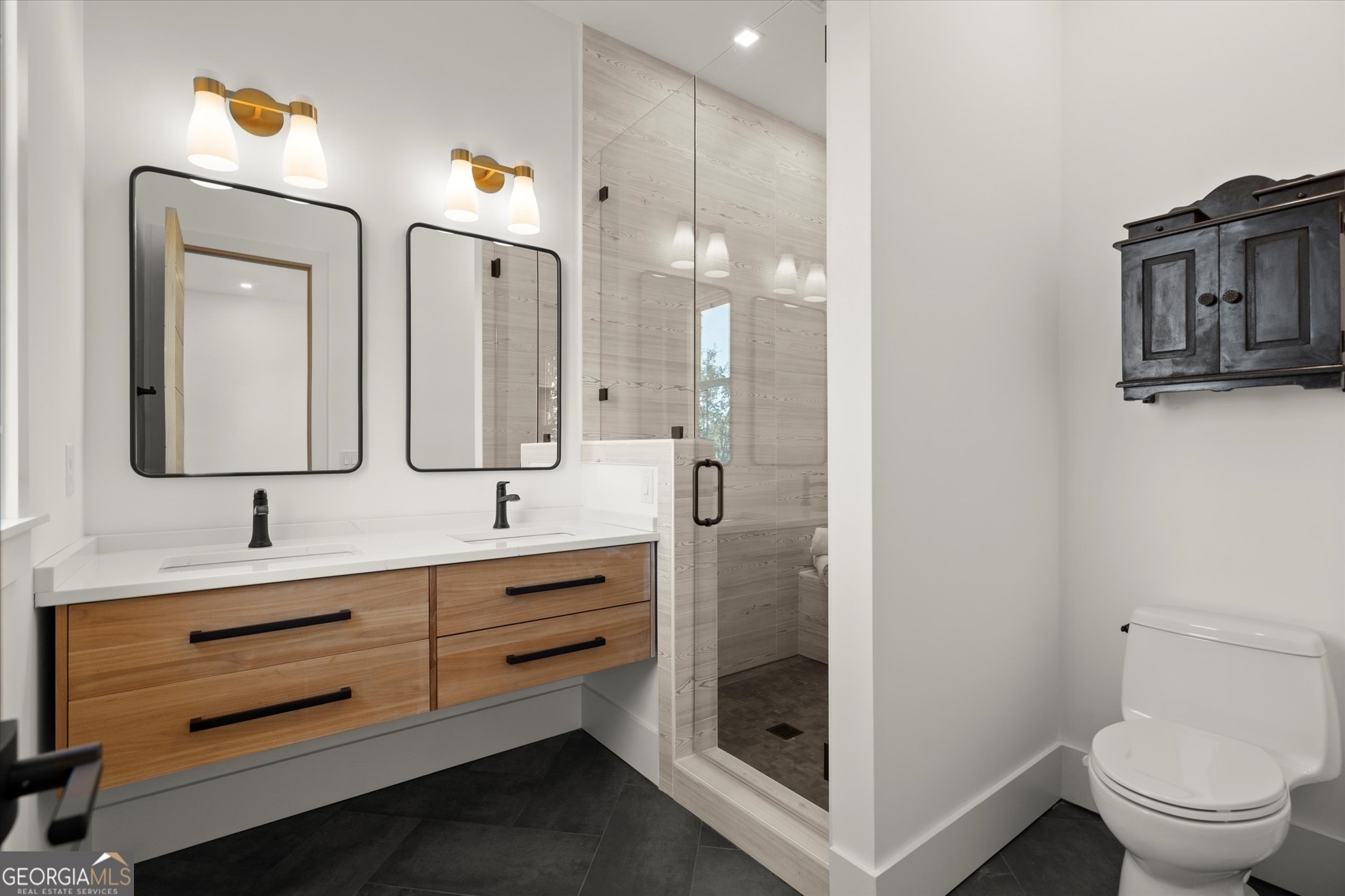 1572 Parker Holifield Road Tiger, GA 30576 - Photo 71 of 84 a bathroom with a toilet sink and mirror