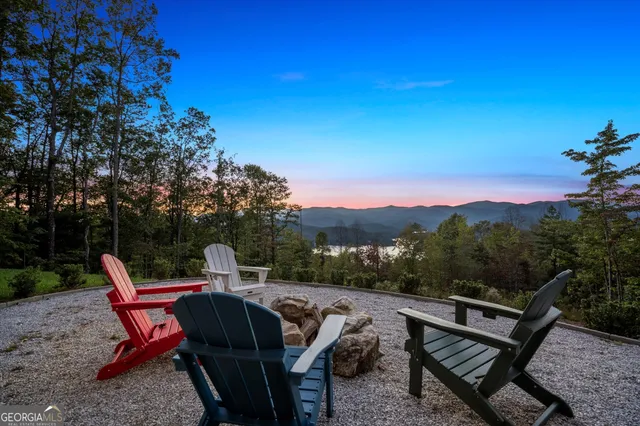 a house with trees in the background