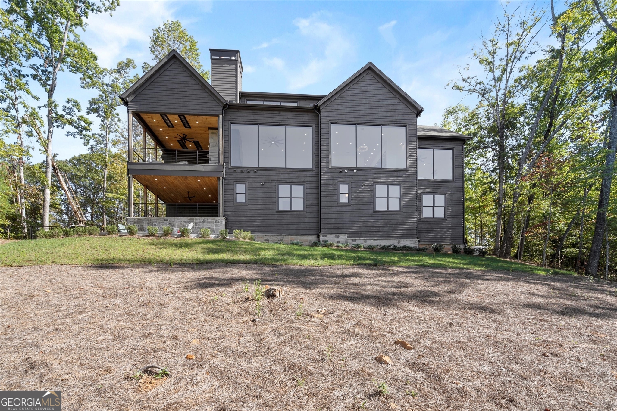 1572 Parker Holifield Road Tiger, GA 30576 - Photo 81 of 84 a front view of a house with a yard and trees