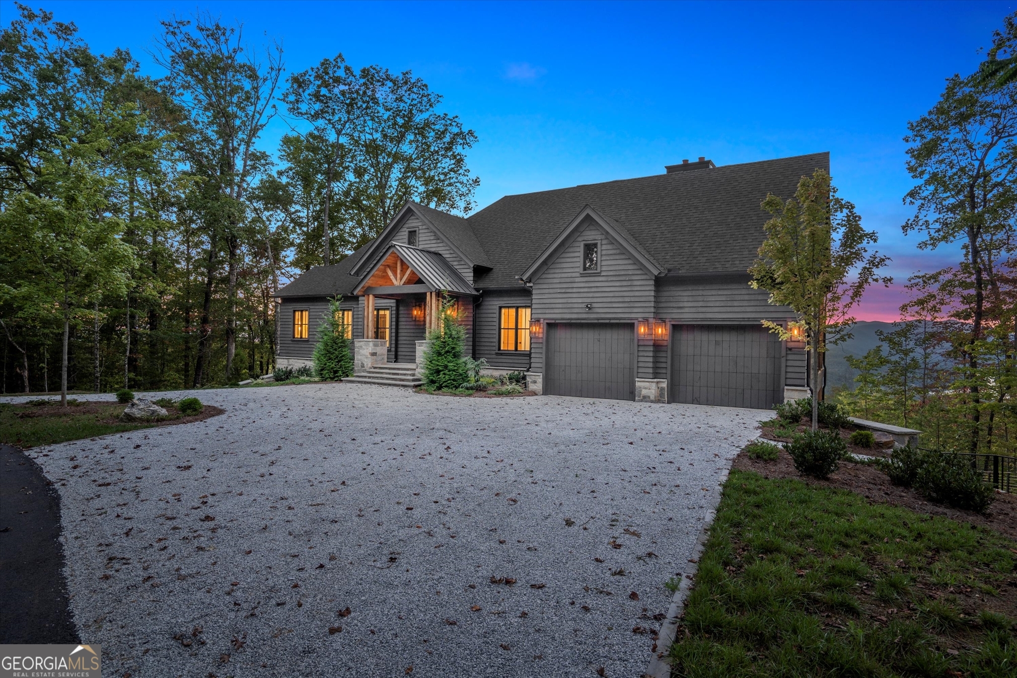 1572 Parker Holifield Road Tiger, GA 30576 - Photo 10 of 84 a house with trees in the background