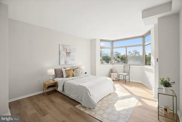 a view of a hallway with washer and dryer