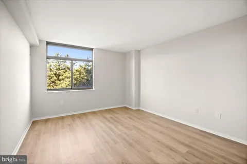 a bathroom with a sink toilet tub and shower