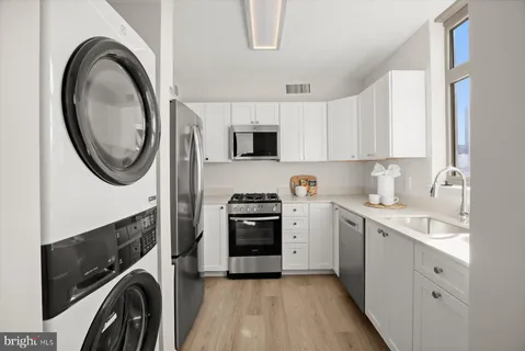 a view of a balcony with chairs