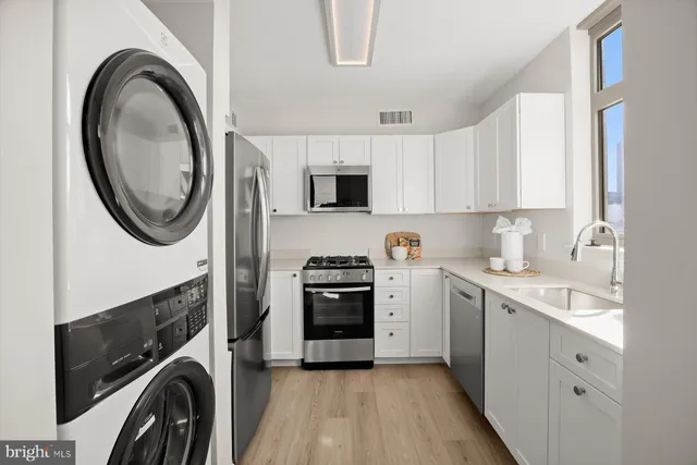 a view of a balcony with chairs