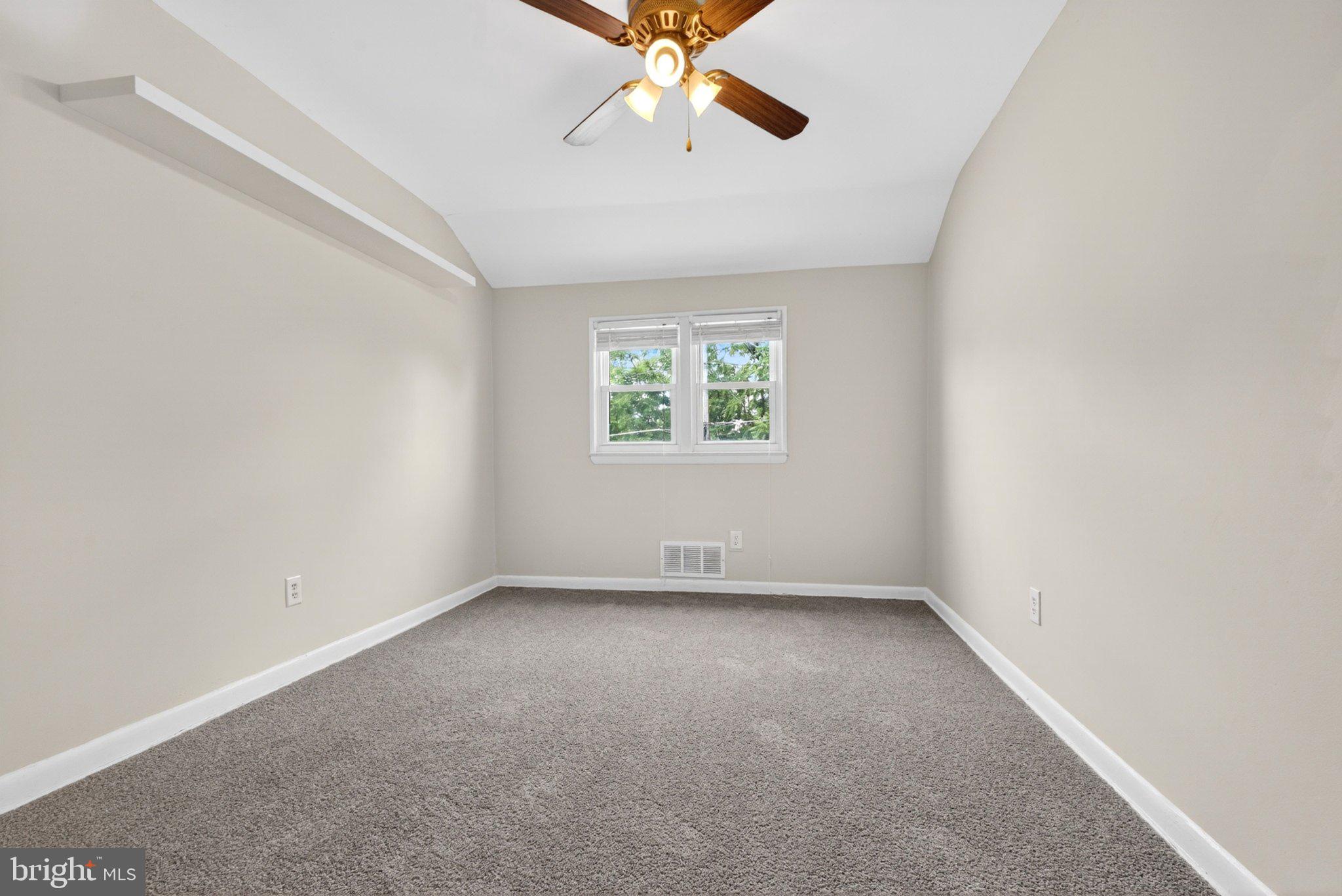 7729 Charlesmont Road Baltimore, MD 21222 - Photo 22 of 38 Bright and airy room with charm.