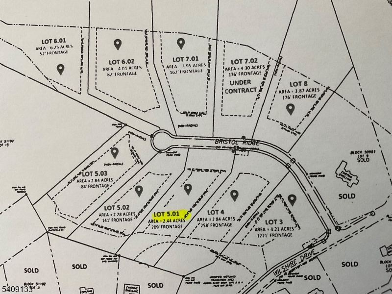 a view of a book shelf